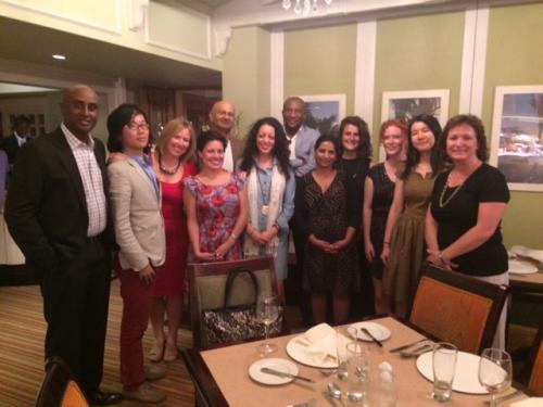 Group of people standing in a restaurant