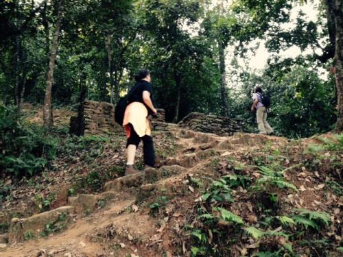 women hiking up a steep path