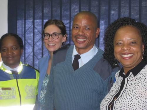 The traffic officer, me, the commander and Camille pose together