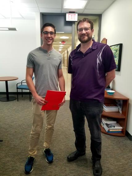 Award recipient Connor Bryant and Chair of IB Dr. Ryan Gregory