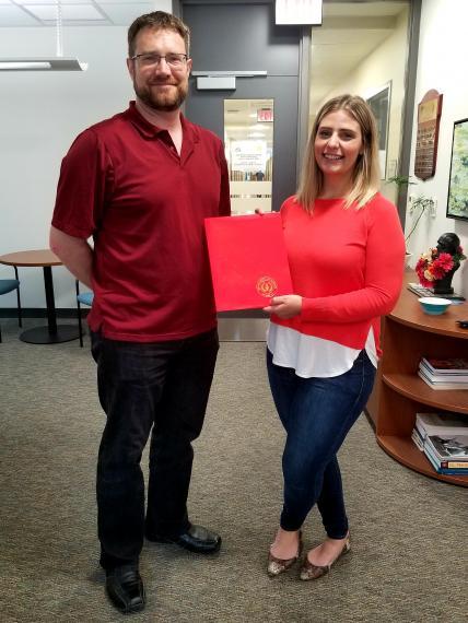 Chair of IB, Dr. Ryan Gregory and award recipient Leah Turner