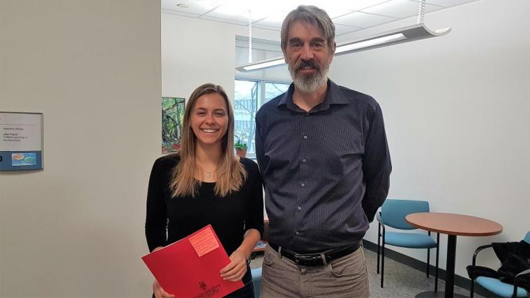 Photo of Bailey Bingham and Dr. John Fryxell, Chair, Integrative Biology