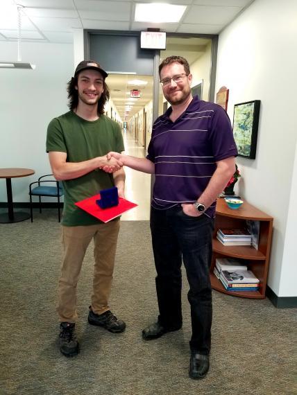 Isaiah Box, award recipient and Dr. Ryan Gregory, Chair of IB