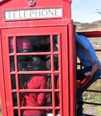 Photo of students in a phone booth