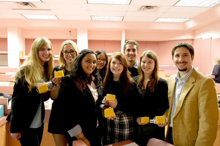 Students holding bars of soap