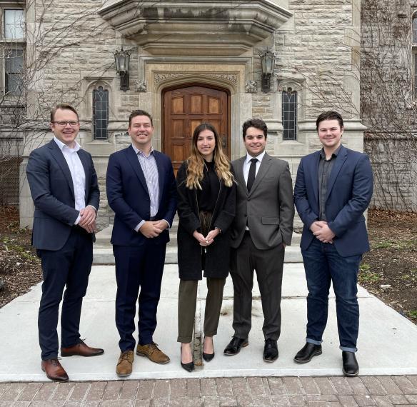 Group of people standing in front of Johnston Hall.