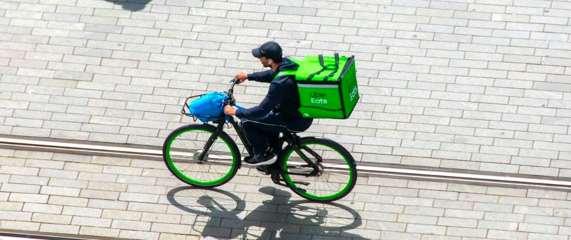 Person on a bike with an Uber eats backpack.