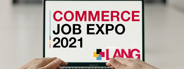Laptop with a screen that reads "Commerce Job Expo 2021"
