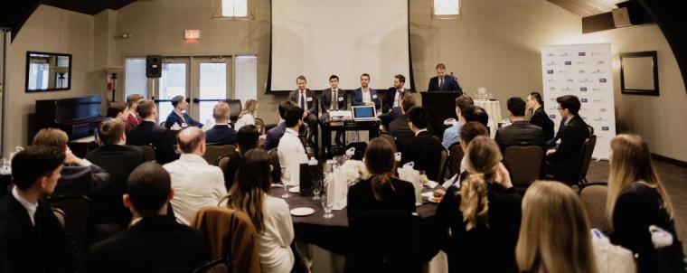 Photo of audience and panel