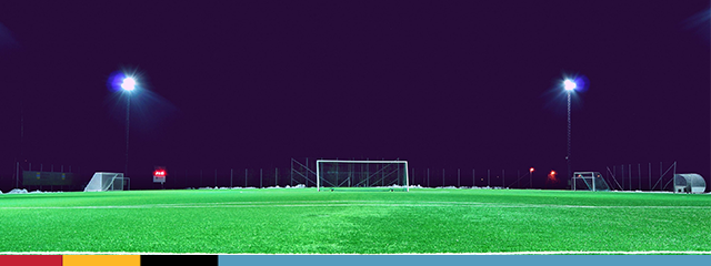 photo of empty soccer field at night