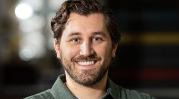 A photo of Alex Mitro, Program Coordinator at the John F. Wood Centre
