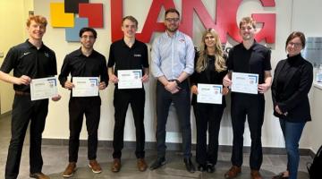 Lang students accepting top honours for the 2nd Annual Lang x Toronto Blue Jays Sport Sales Pitch Competition. From left: Tim Blackmore, Nick D’Agostino, Scott Vanos, Tom Zapletal, Morgan Lunney, Tristan Elkin, and Katie Lebel.