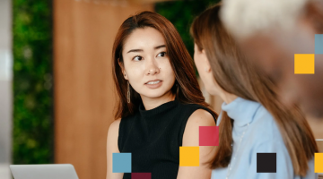 project management leader talking to coworker