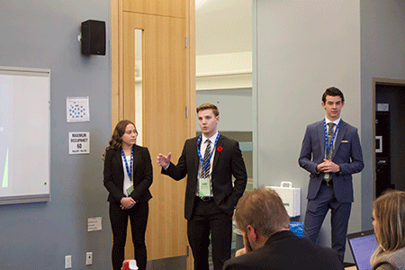 Students presenting at case competition