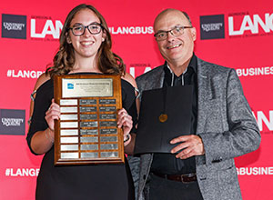 Lauren Grant receiving award