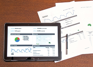 tablet with pie graph and data