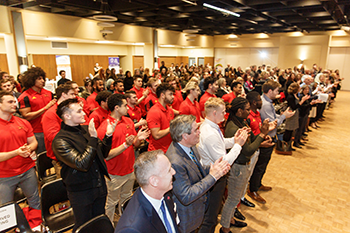 Photo of Gryphon Football players standing