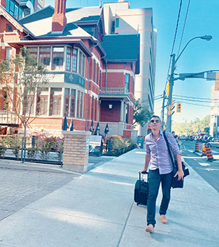 Nicholas walking to a meeting