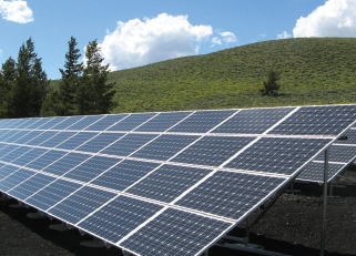 solar panels on a green field