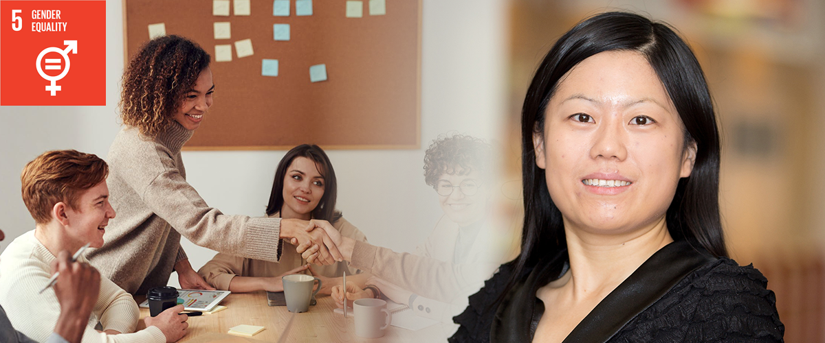 Photo of Jing Lu with a photo of a diverse board of directors in the background