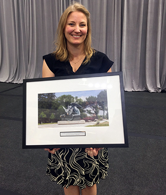 Dr. Lianne Foti with the award plaque