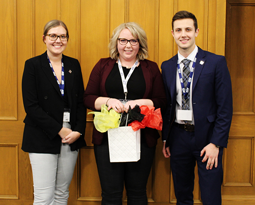 Jaclyn Cairns receiving a thank you gift