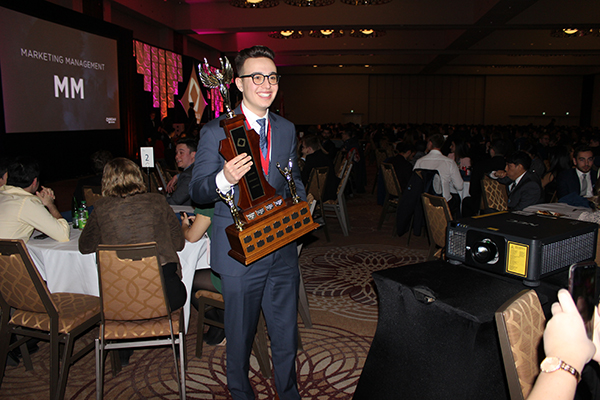 U of G student delegate with trophy