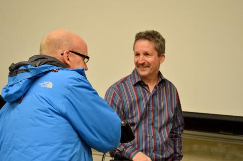 Jim Estill speaks with event attendee