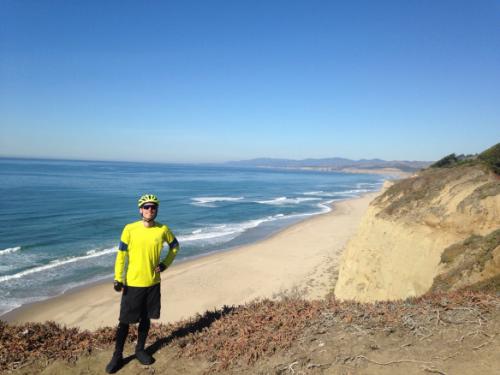 Cole Crawford poses on the Pacific Ocean beach.