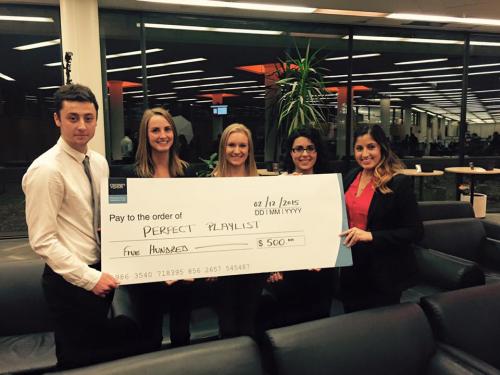 Group photo of Gryphons' Den winners holding oversized cheque for $500