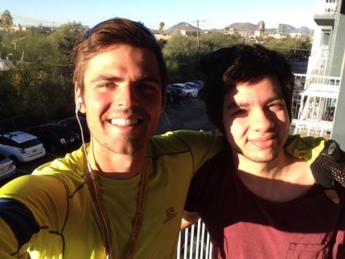 a picture of Cole Crawford and a friend from his charitable journey