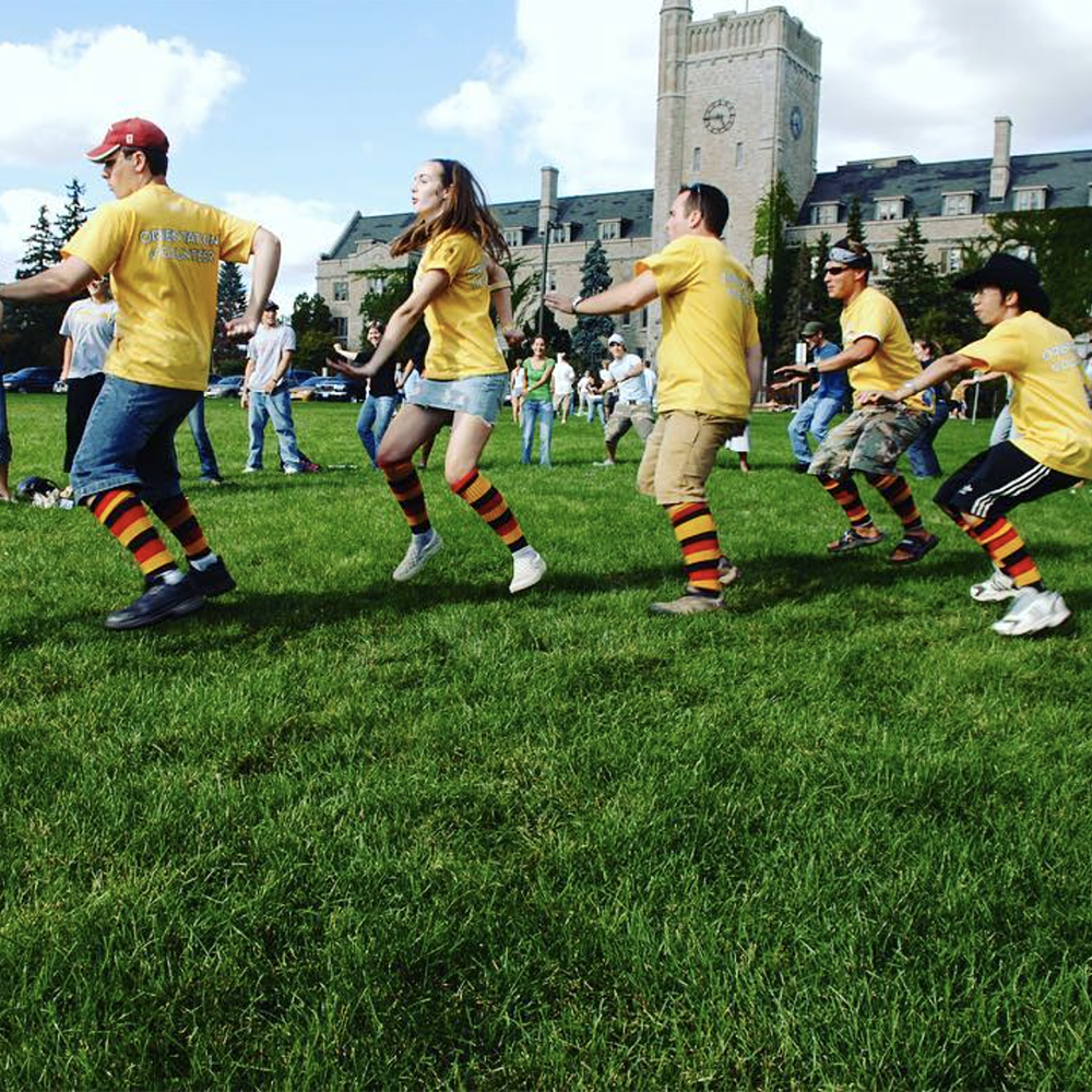 students on Johnston Green with Johnston Hall in the background