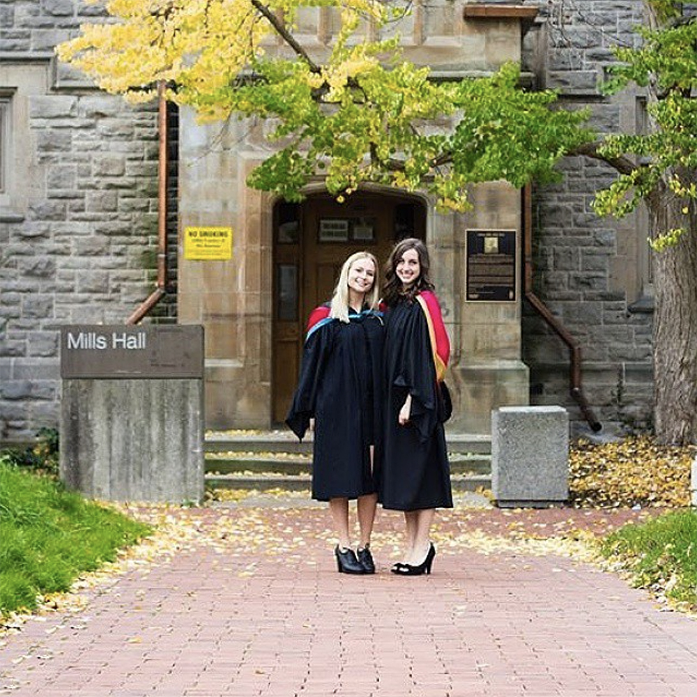 Grads in front of Mills Hall