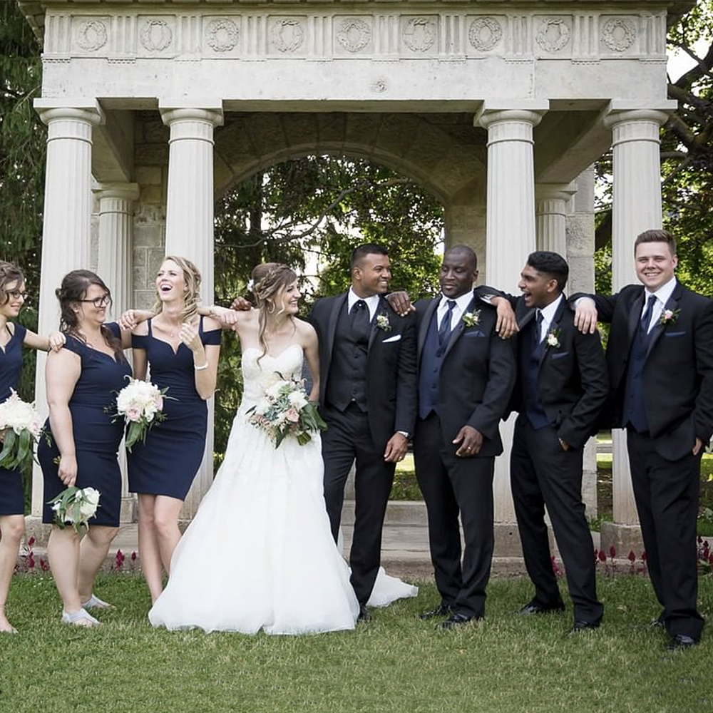 A wedding party in front of The Portico