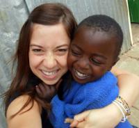 Photo of Amy Faria volunteering in Africa