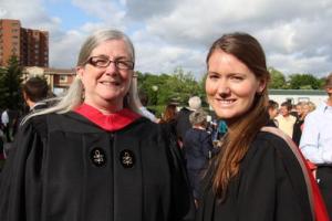 Photo of Jane Londerville and graduating student at convocation.
