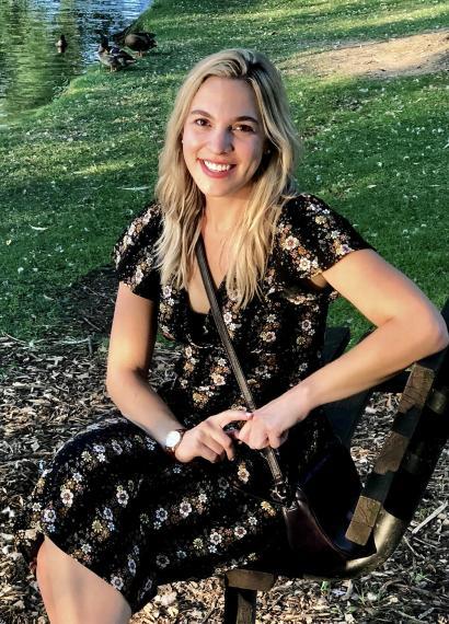 Leaf Serafini sitting on a bench