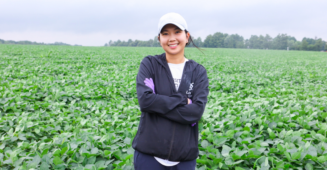 photo of chi in a field with her arms crossed