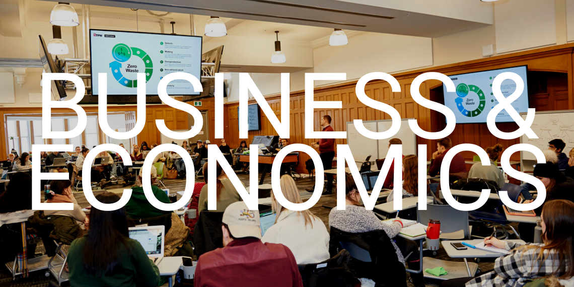 students in a classroom with the words "business & economics" overlayed