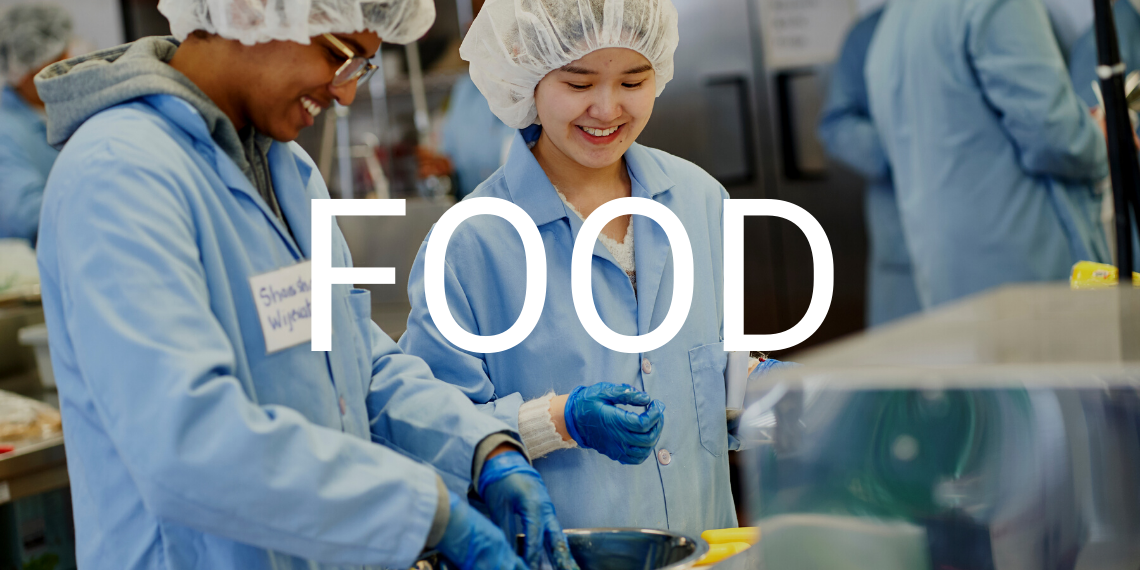 Two students in a food science lab, with the text "Food" overlaid.