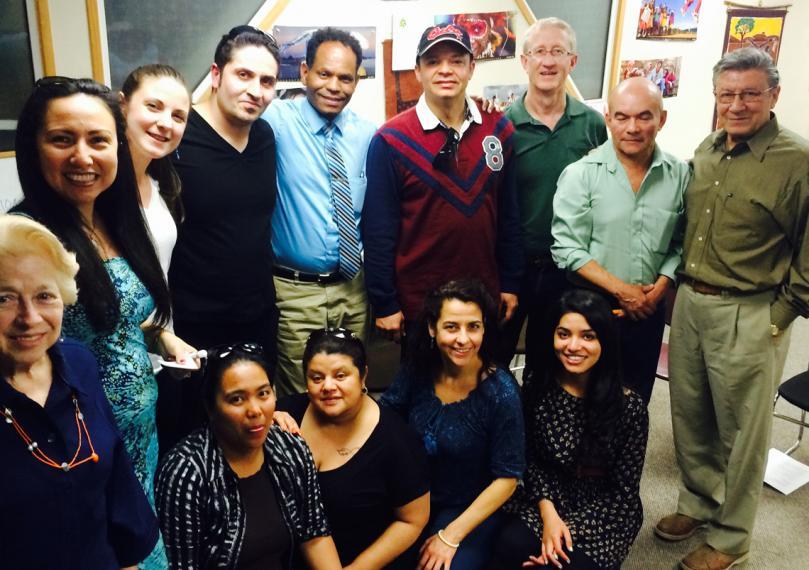 University of Guelph researchers with Perth County participants standing and kneeling together  at a focus group