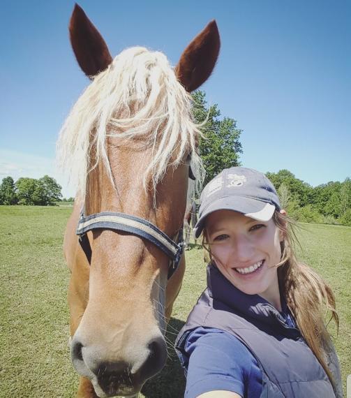 Maddie with a horse.