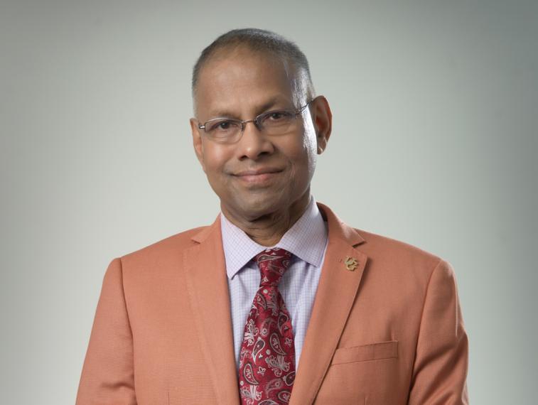 Amar Mohanty in salmon coloured suit