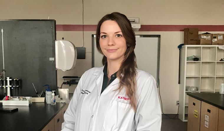 Head shot of Katherine in a food science laboratory.