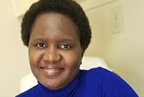Head shot of Busayo Kodaolu.