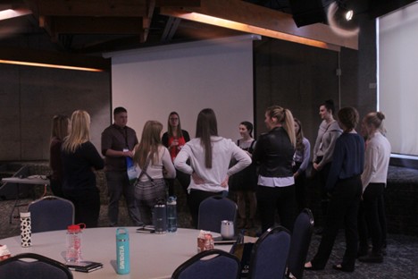 Students playing a leadership game