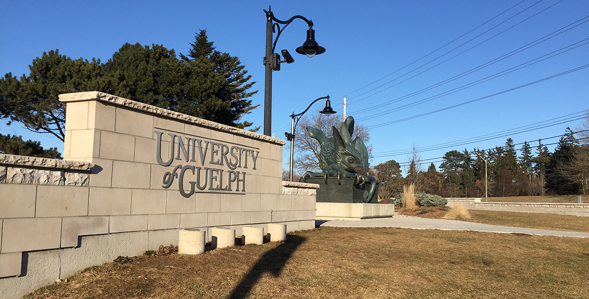 Entrance sign and Gryphon at University of Guelph