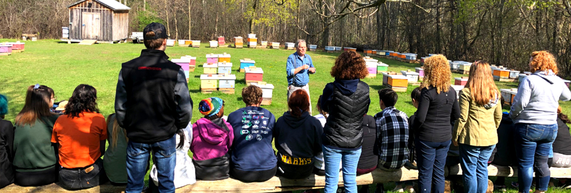 Students getting a tour of the Honey Bee Research Centre.