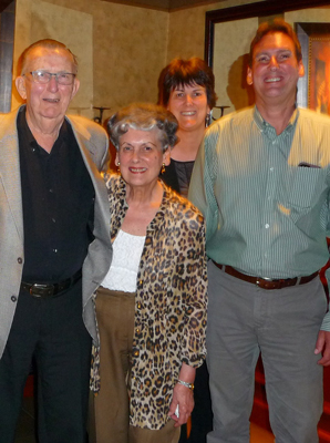 Bruce, Saralie, Stephanie and Brad standing together smiling