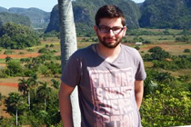 Alex Rozenfeld stands above fields in Costa Rica.